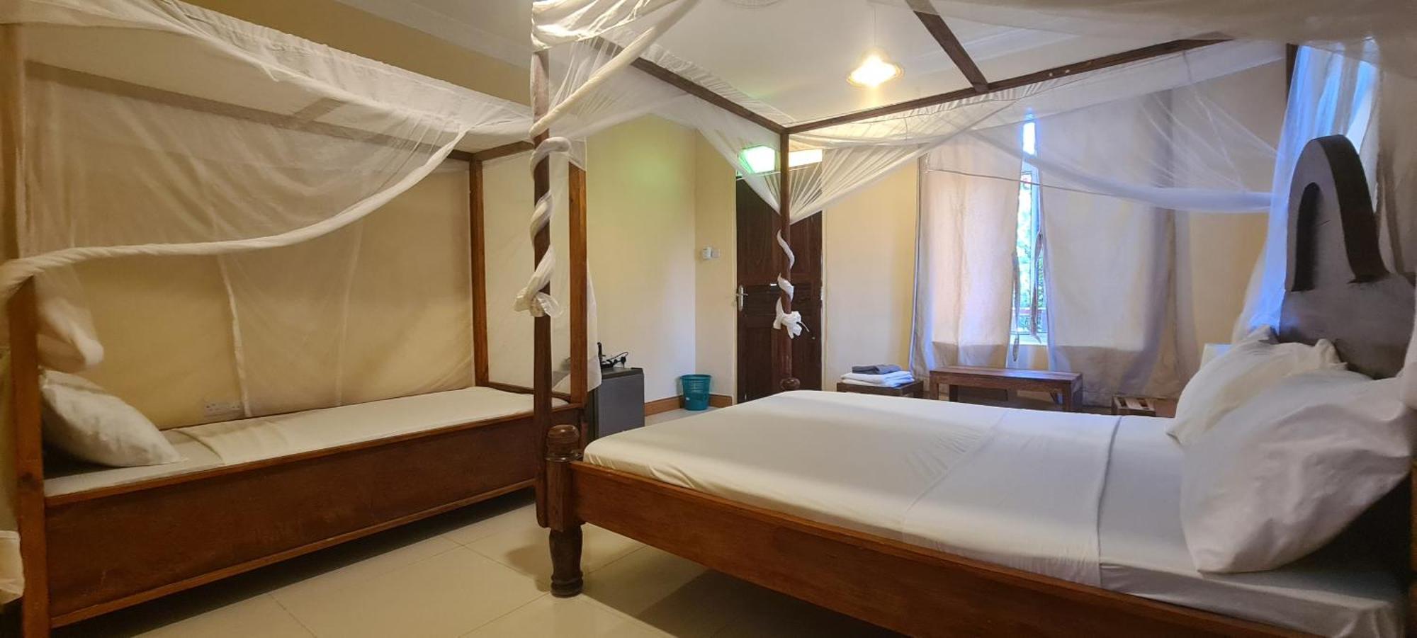 Отель Mambo Boutique Нунгви Экстерьер фото