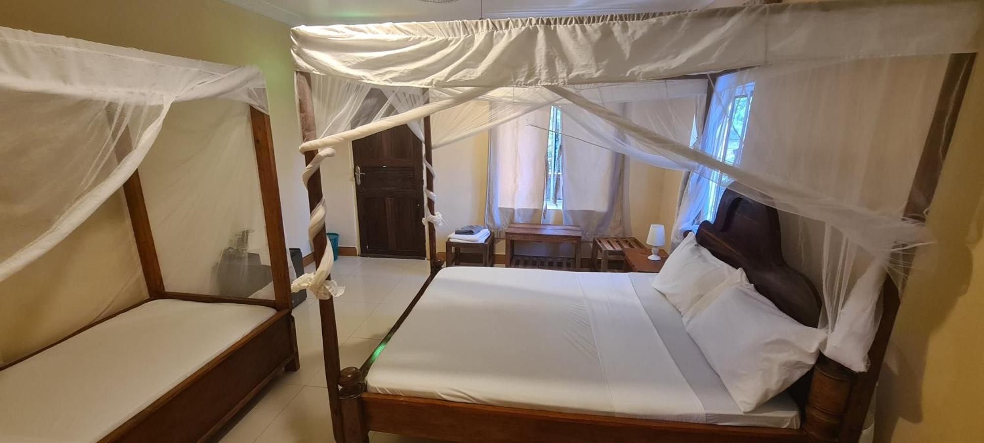 Отель Mambo Boutique Нунгви Экстерьер фото